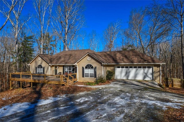 ranch-style house featuring a garage