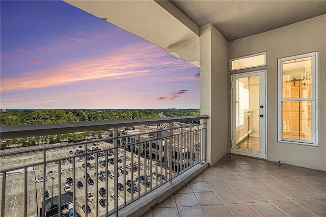 view of balcony at dusk