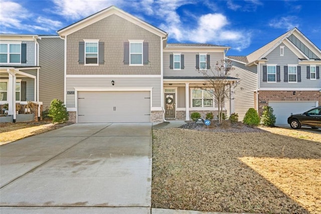 view of front of house with driveway and a garage