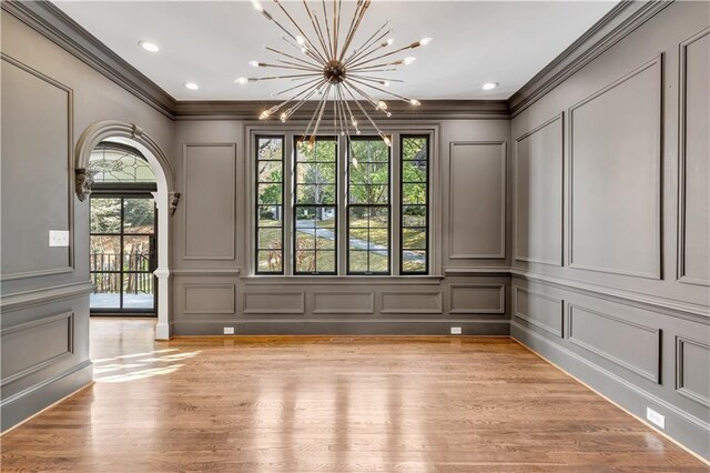 kitchen featuring tasteful backsplash, dark wood-style floors, beamed ceiling, a peninsula, and stainless steel appliances