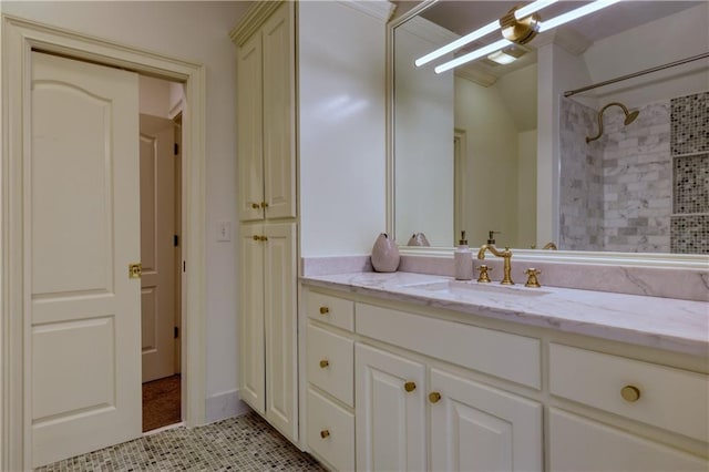 full bathroom with tile patterned flooring, walk in shower, and vanity