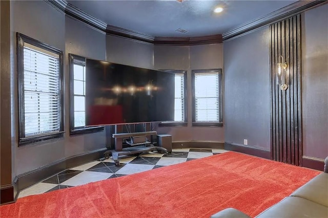 tiled bedroom featuring multiple windows, crown molding, visible vents, and baseboards