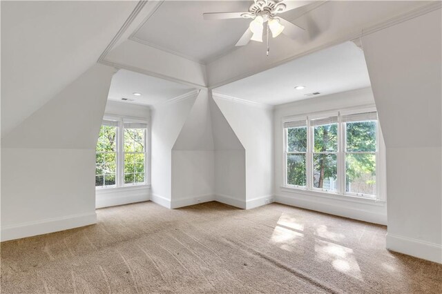 unfurnished living room featuring a large fireplace, baseboards, visible vents, wood finished floors, and crown molding