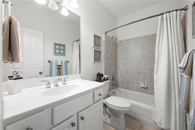 full bathroom with tile patterned flooring, shower / bath combination with curtain, vanity, and toilet