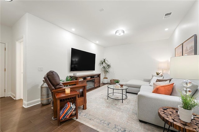 living room featuring dark hardwood / wood-style floors