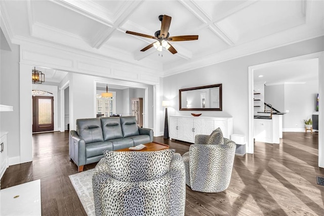 living room with dark wood-style flooring, beam ceiling, a ceiling fan, coffered ceiling, and baseboards