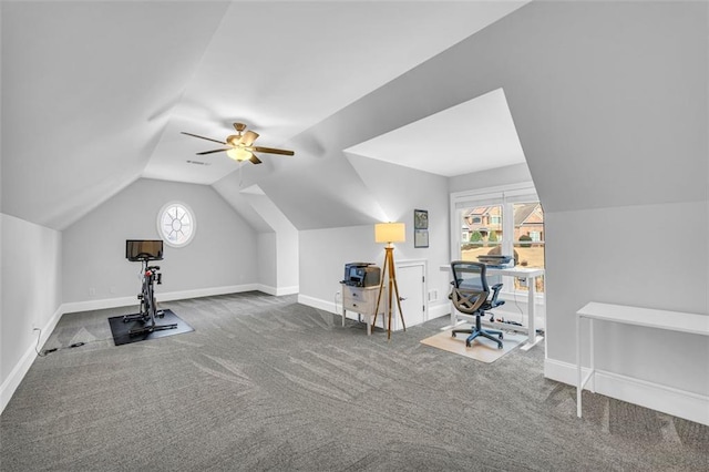 workout area featuring carpet, ceiling fan, lofted ceiling, and baseboards