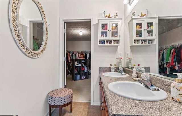 bathroom featuring vanity and tile patterned flooring