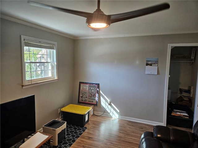 game room featuring crown molding and wood-type flooring