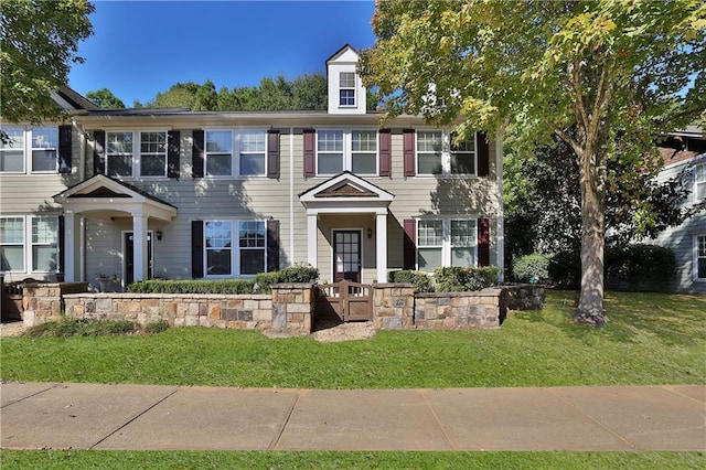 view of front of house featuring a front lawn