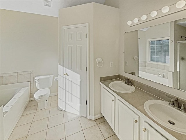 full bathroom featuring toilet, vanity, separate shower and tub, and tile patterned flooring