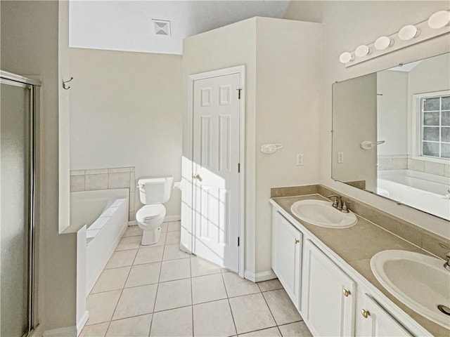 full bathroom with vanity, plus walk in shower, toilet, and tile patterned flooring