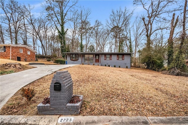 single story home featuring a porch