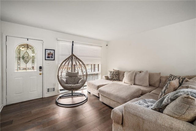 living room with dark hardwood / wood-style floors