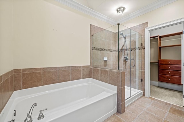 bathroom featuring shower with separate bathtub, tile patterned floors, and crown molding