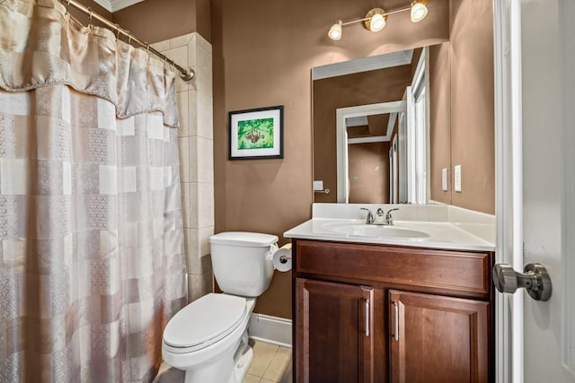 bathroom with walk in shower, tile patterned flooring, toilet, vanity, and ornamental molding