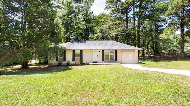 ranch-style home with a front lawn