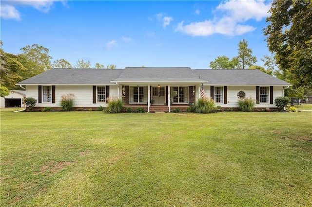 single story home featuring a front yard