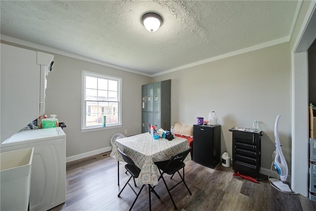 334 Glenn Abby Ln, Pendergrass, GA 30567 - dining room with a textured ceiling, washer / dryer, wood finished floors, crown molding, and baseboards