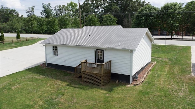 334 Glenn Abby Ln, Pendergrass, GA 30567 - rear view of property with a lawn and metal roof