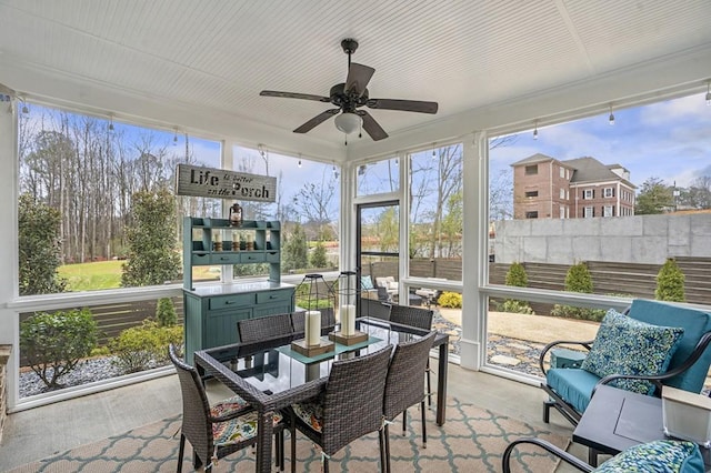 sunroom / solarium with ceiling fan