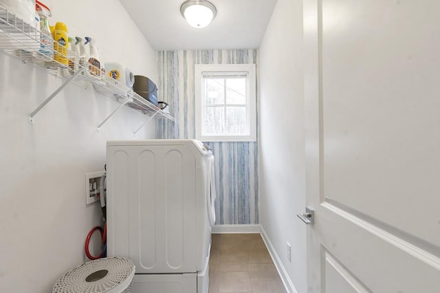 washroom with laundry area, washer / clothes dryer, wallpapered walls, and baseboards