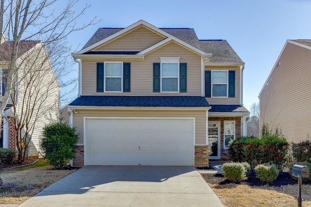 view of front of property featuring an attached garage, stone siding, a shingled roof, and concrete driveway