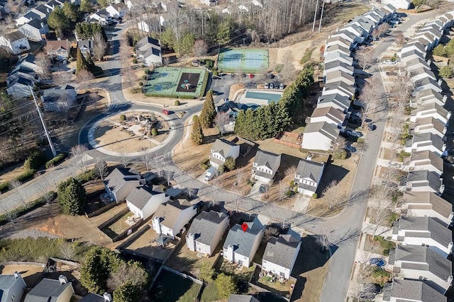 birds eye view of property with a residential view