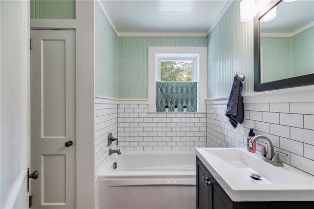 bathroom featuring vanity, a tub to relax in, crown molding, and tasteful backsplash