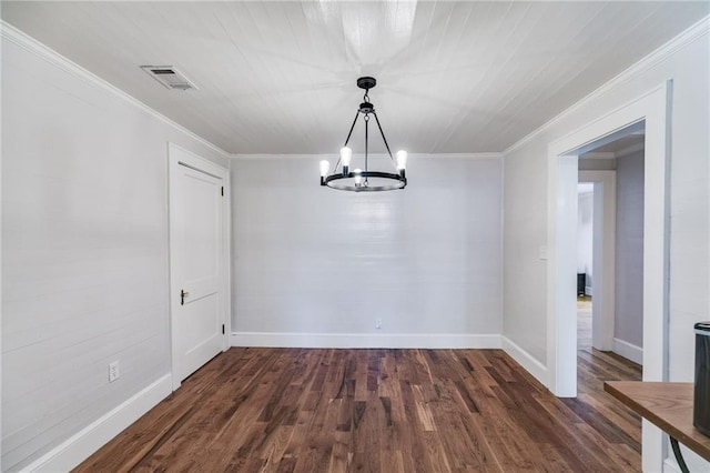 unfurnished dining area with ornamental molding, a notable chandelier, and dark wood-type flooring