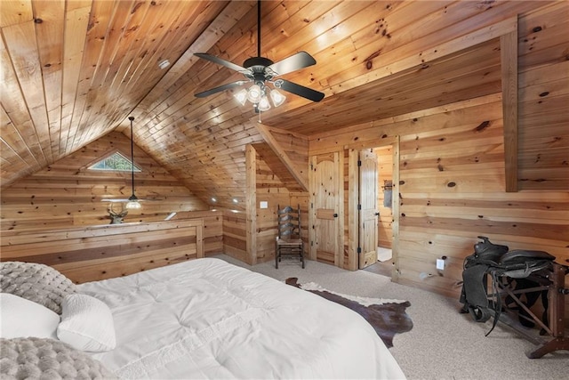 bedroom featuring lofted ceiling, wooden ceiling, carpet flooring, and wooden walls