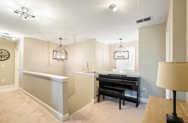 48 Ironwood Ct, Dallas, GA 30132 - hall featuring carpet floors, baseboards, visible vents, and an upstairs landing