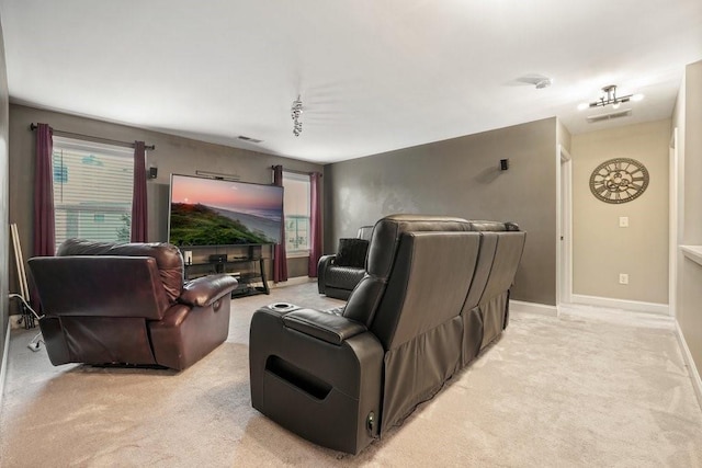 48 Ironwood Ct, Dallas, GA 30132 - home theater room featuring baseboards, visible vents, and light colored carpet