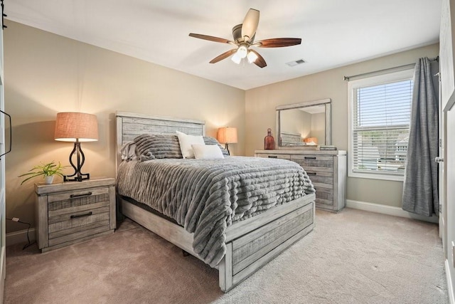 48 Ironwood Ct, Dallas, GA 30132 - bedroom featuring light carpet, baseboards, visible vents, and ceiling fan