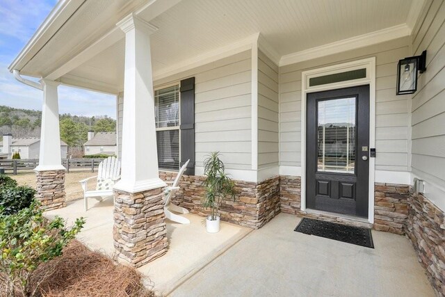 48 Ironwood Ct, Dallas, GA 30132 - view of exterior entry featuring covered porch and stone siding