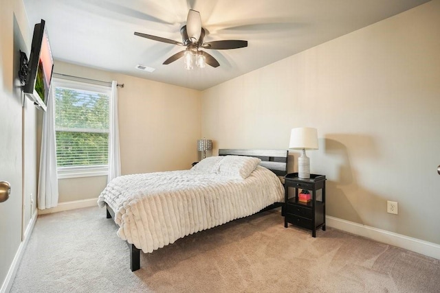 48 Ironwood Ct, Dallas, GA 30132 - bedroom with light carpet, ceiling fan, visible vents, and baseboards