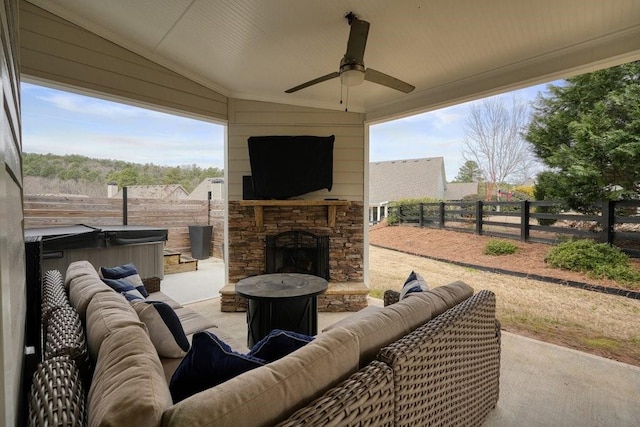 48 Ironwood Ct, Dallas, GA 30132 - view of patio / terrace featuring an outdoor living space with a fireplace, a fenced backyard, a ceiling fan, and a hot tub