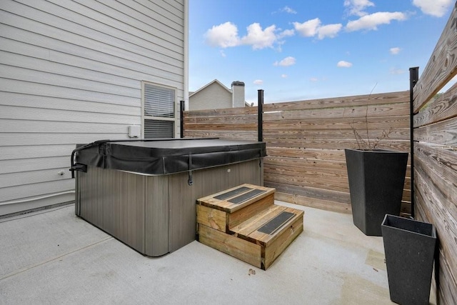 48 Ironwood Ct, Dallas, GA 30132 - view of patio / terrace with fence and a hot tub