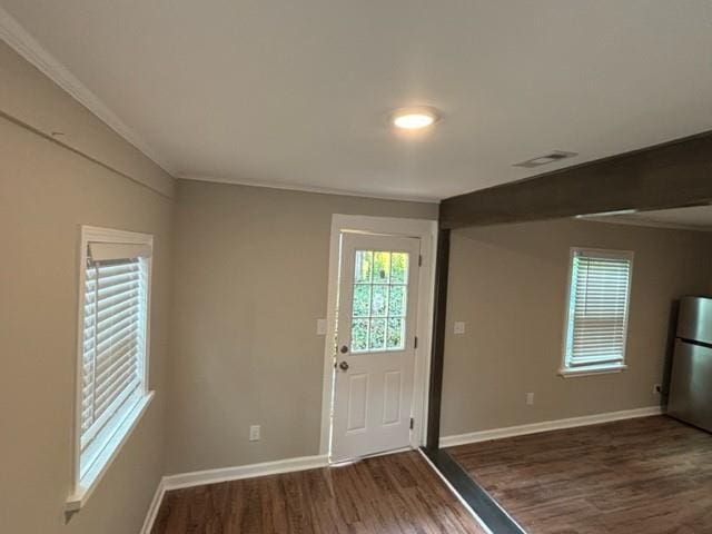 entryway with dark wood-type flooring