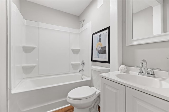 full bathroom featuring shower / bathtub combination, vanity, and toilet