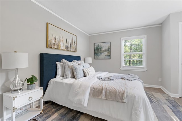 bedroom with ornamental molding