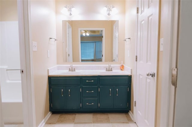 110 Fox Meadow Dr, Covington, GA 30016 - bathroom with double vanity and a ceiling fan