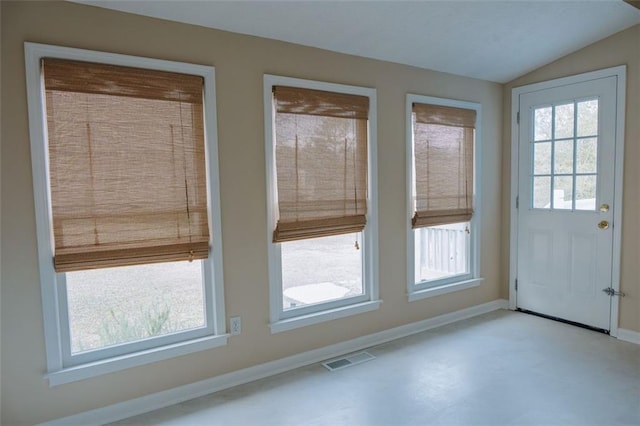 110 Fox Meadow Dr, Covington, GA 30016 - doorway to outside with baseboards, healthy amount of natural light, and vaulted ceiling