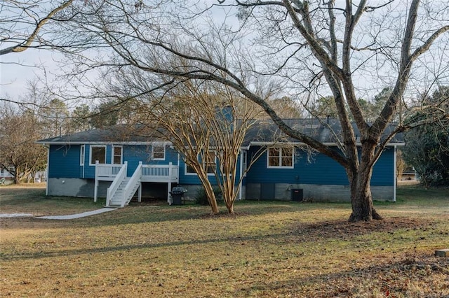 110 Fox Meadow Dr, Covington, GA 30016 - view of front of property featuring crawl space, a front lawn, stairs, and a deck