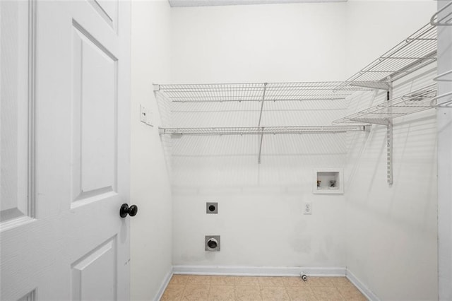 laundry area featuring hookup for an electric dryer, baseboards, laundry area, and hookup for a washing machine