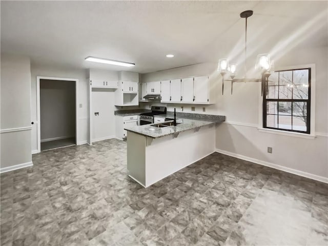 kitchen featuring white cabinetry, dark stone countertops, stainless steel range oven, decorative light fixtures, and kitchen peninsula