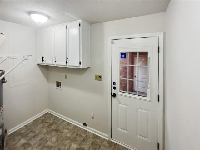 laundry room featuring hookup for a washing machine and cabinets