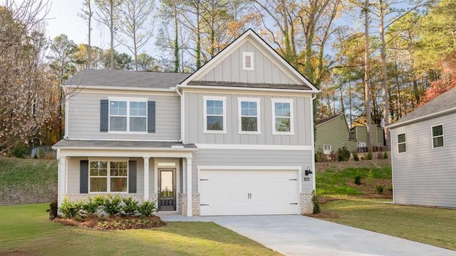 craftsman-style home with a garage and a front lawn