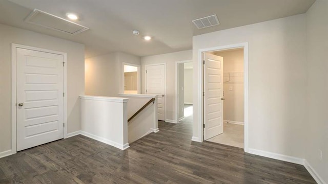 spare room featuring dark hardwood / wood-style floors