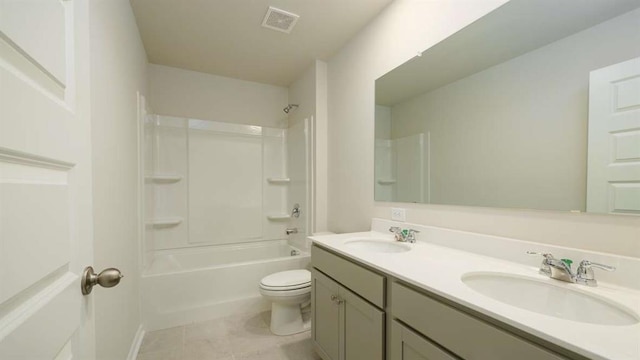 full bathroom featuring tile patterned flooring, vanity, shower / bathtub combination, and toilet